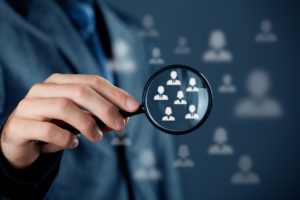 Magnifying glass highlighting the importance of knowing your audience